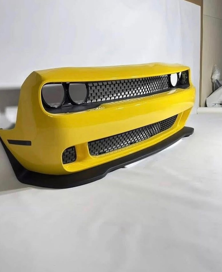 Brand new Dodge Challenger yellow bumper.